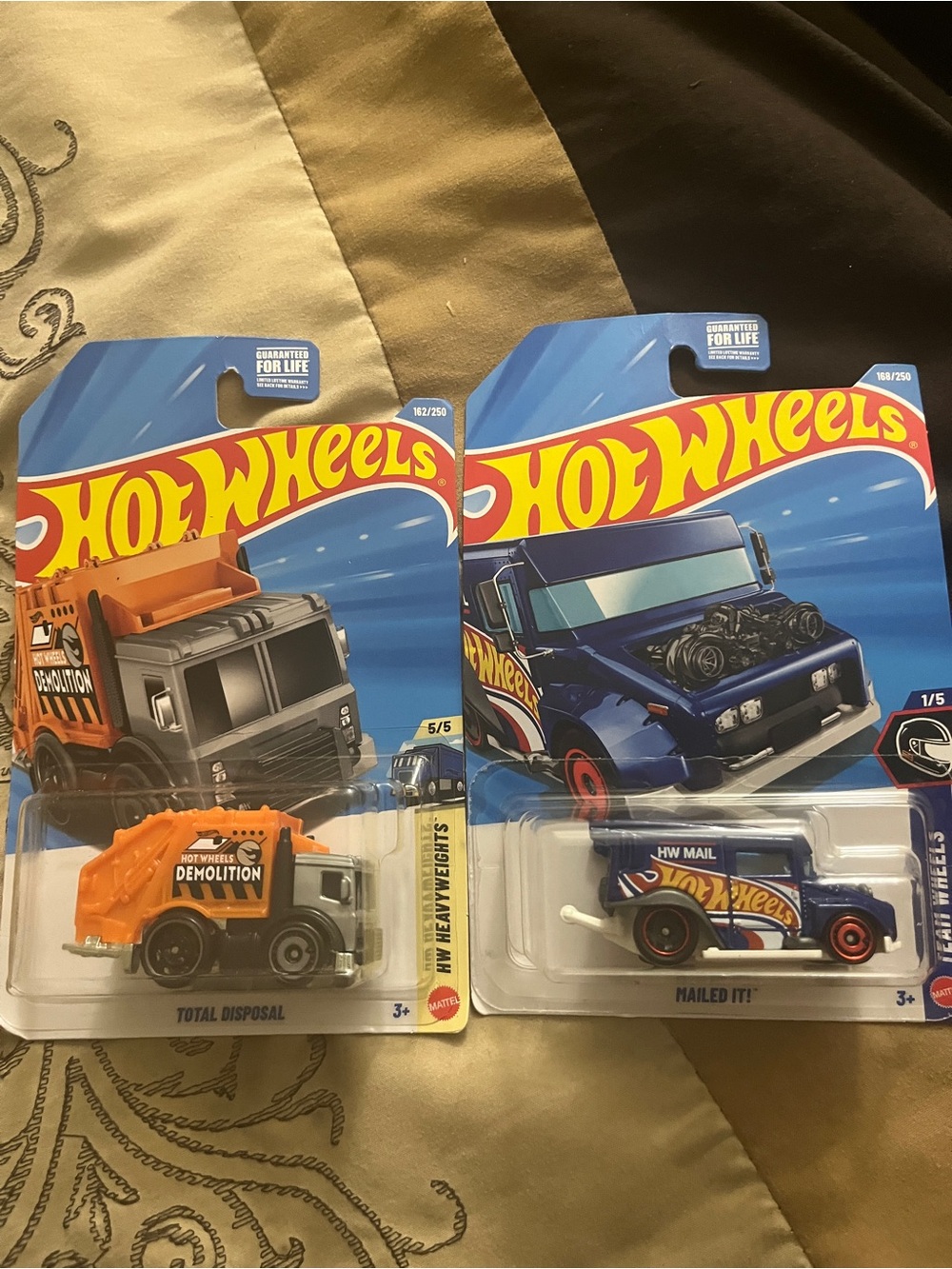 Hot Wheels Orange Demolition Truck & Blue HW Mail Van - 2-Pack